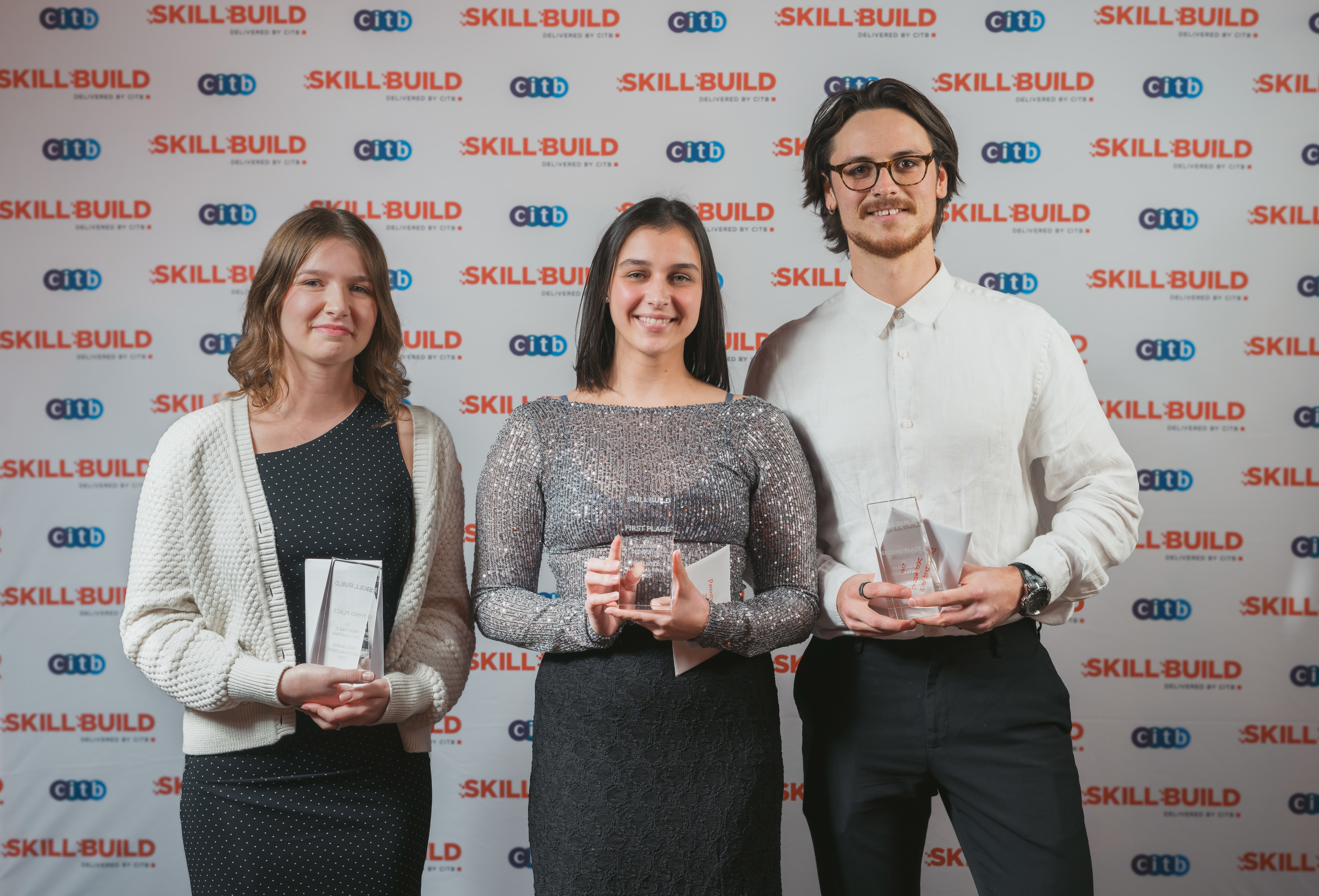 Painting & Decorating Skillbuild 2025 Winners - 3rd (Izzy Cobbold), 1st (Kirsten Jackson) and 2nd place (Nathan Oliver).
